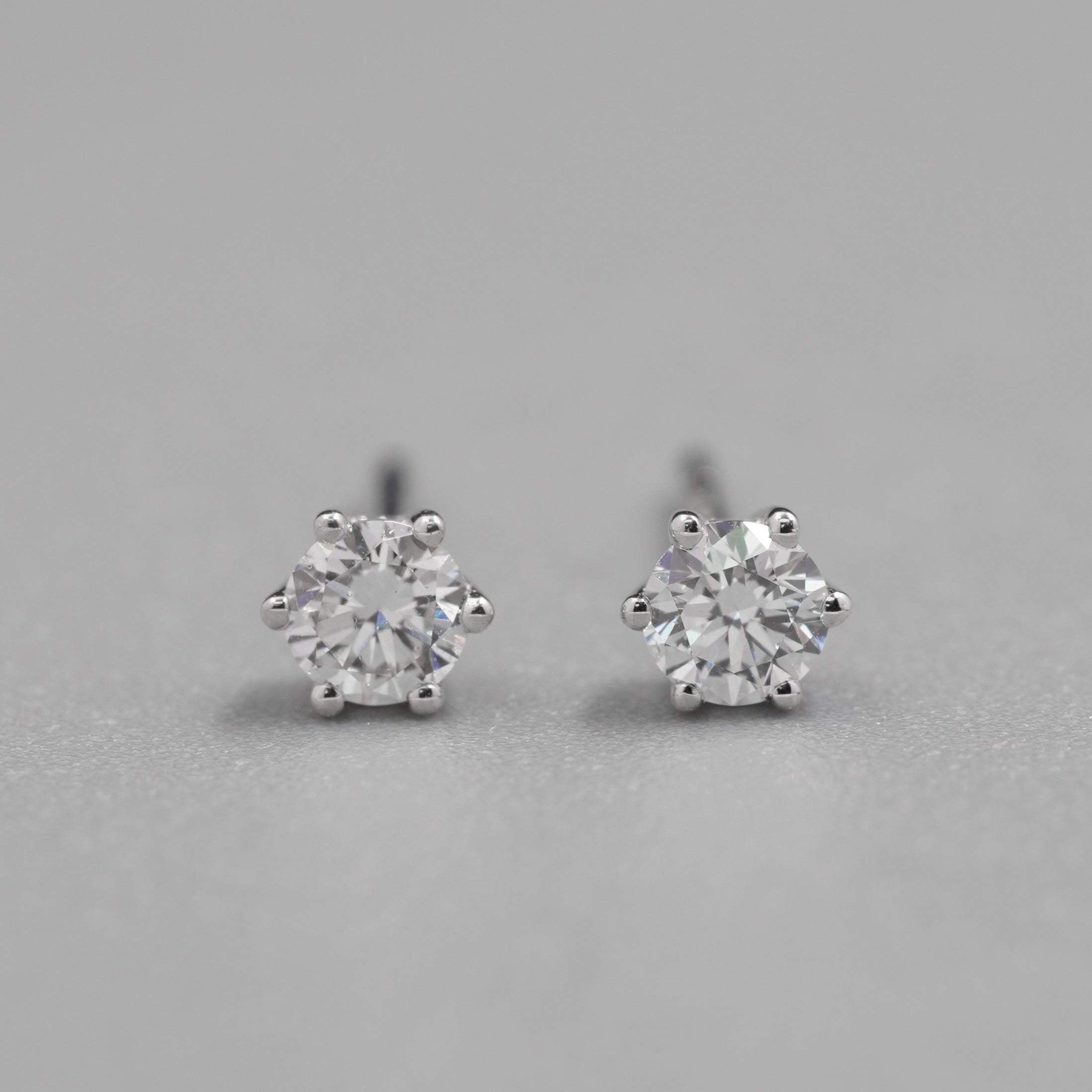 0.10CT Each Diamond Six Prings Earrings Stud