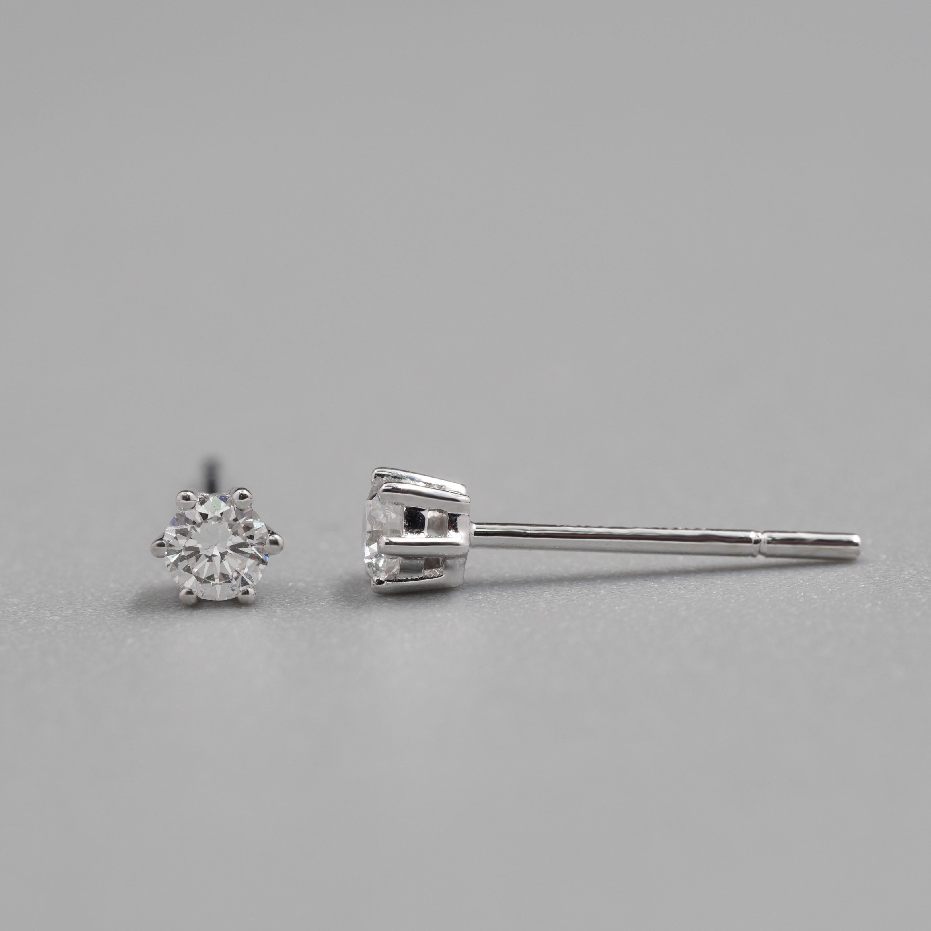 0.10CT Each Diamond Six Prings Earrings Stud