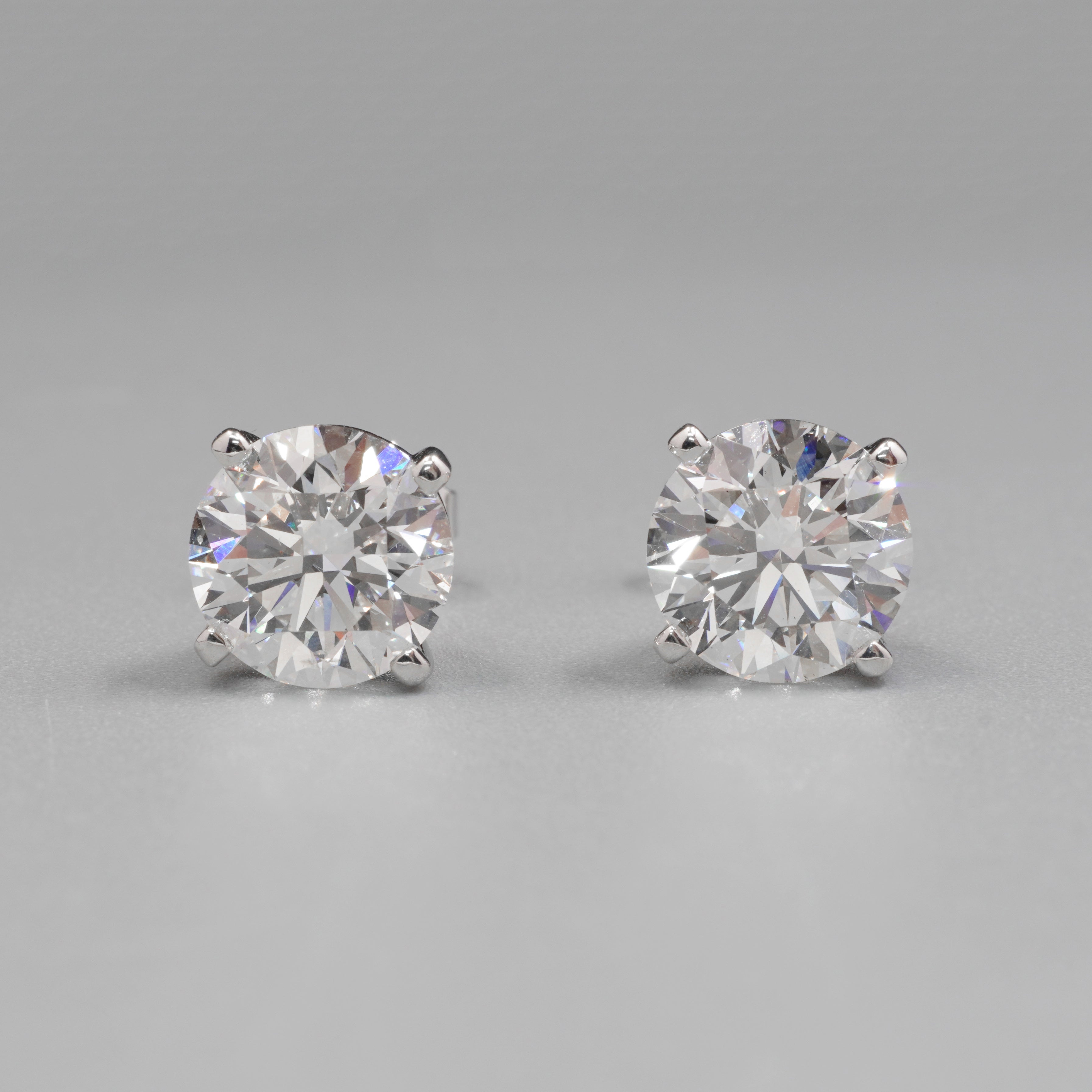 0.7CT Each Four Prongs Diamond Earrings Stud