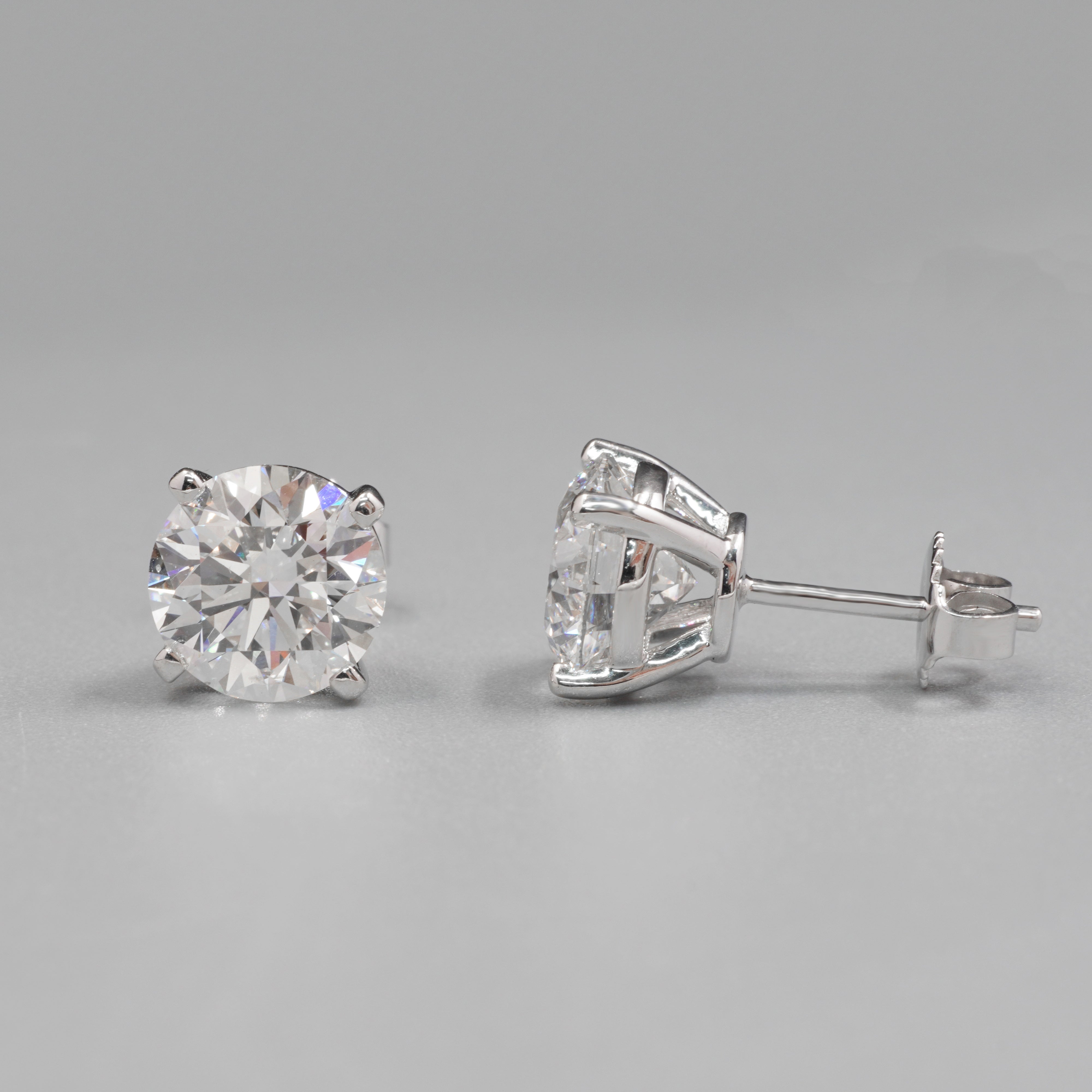 0.7CT Each Four Prongs Diamond Earrings Stud