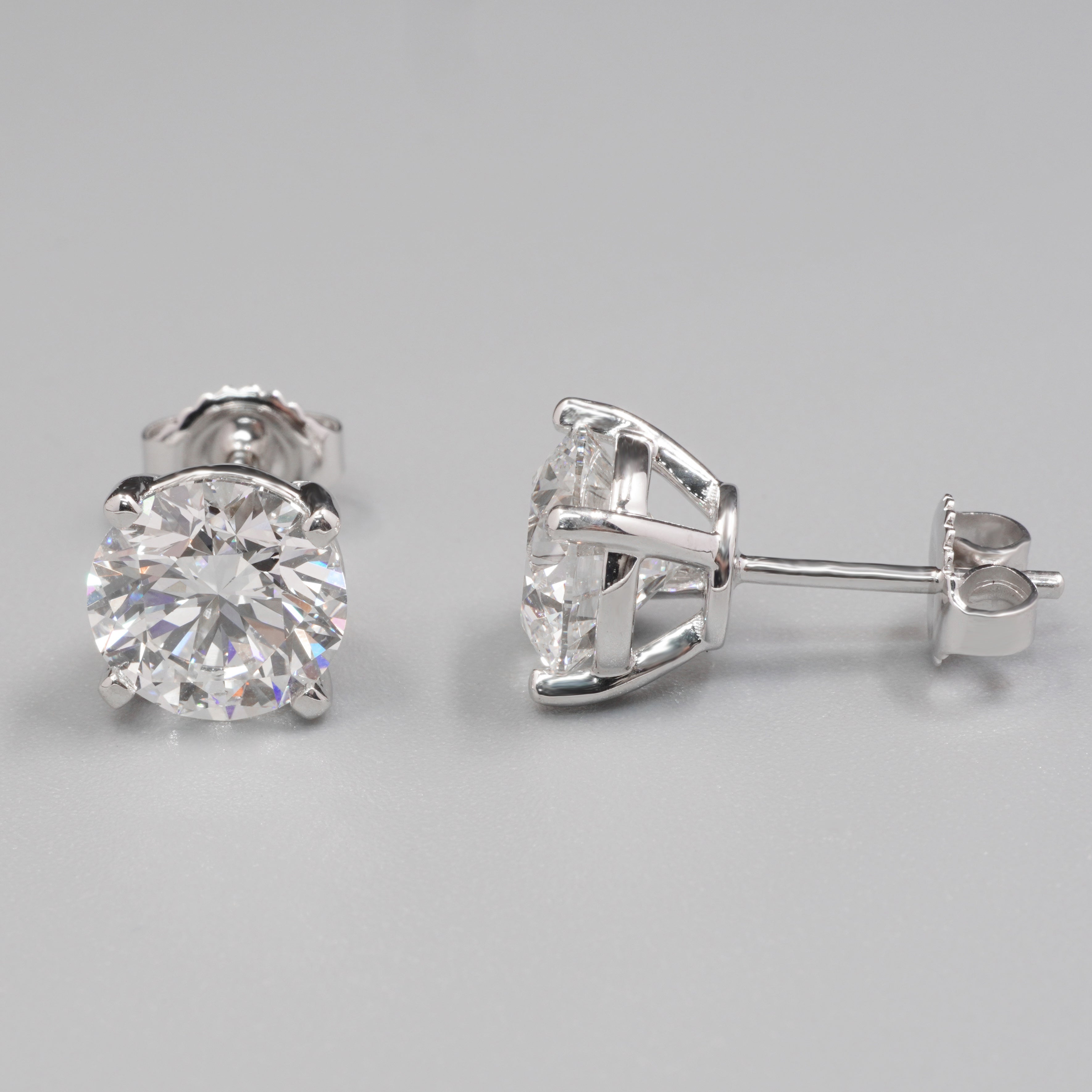 0.7CT Each Four Prongs Diamond Earrings Stud